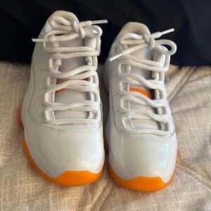 Women Jordan’s   White and Orange Sneakers